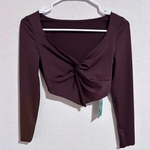brown v cut top with tie at chest